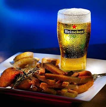 Romanii beau mai putina bere! Cifra de afaceri Heineken a scazut